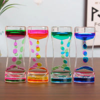 Colorful liquid motion bubbler hourglass with oil drops climbing a ladder